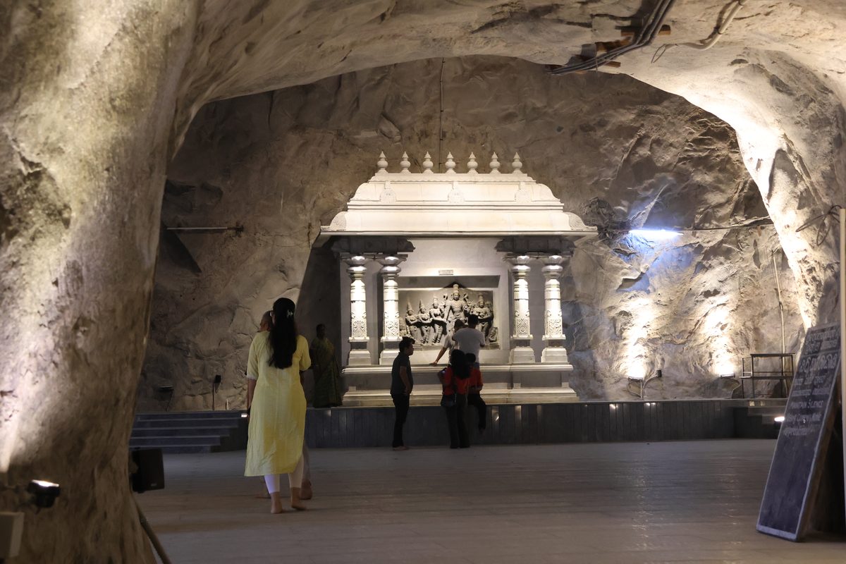 Interior view of the Kailasagiri Cave Temple complex showing carved rock chambers